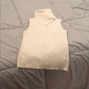 Asymmetrical mock neck sleeveless ribbed cream top